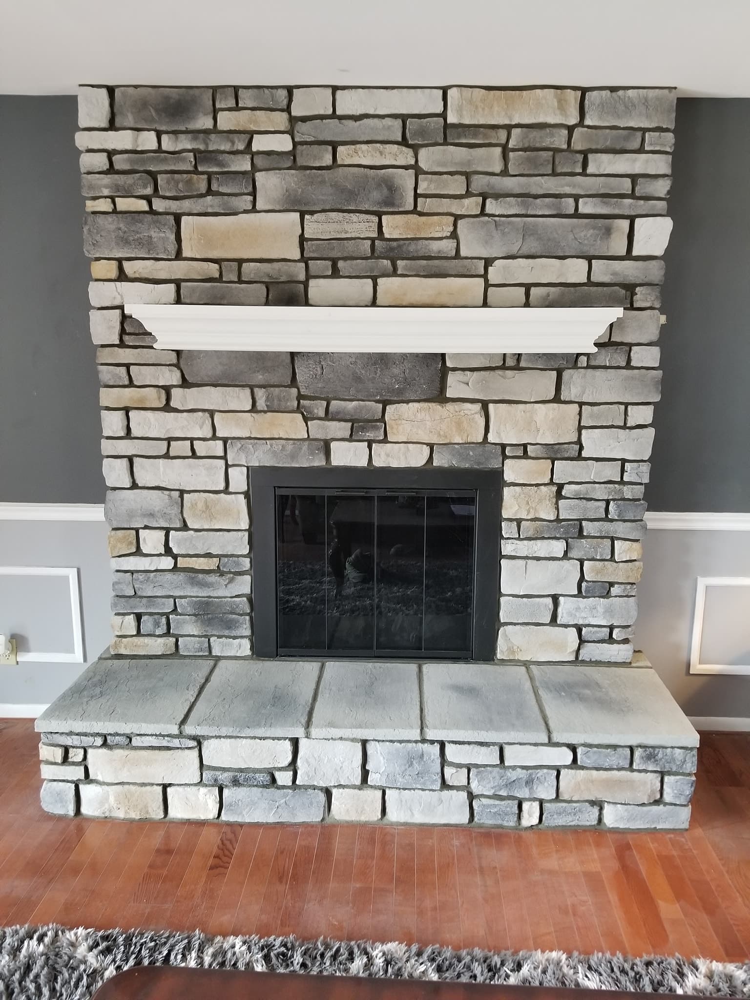 Stone veneer chimney rebuild