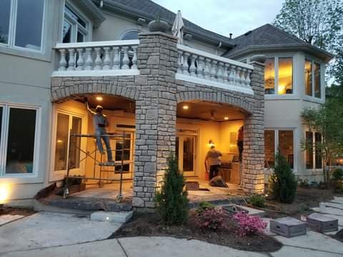Brick veneer foundation installed by Bates Custom Stone